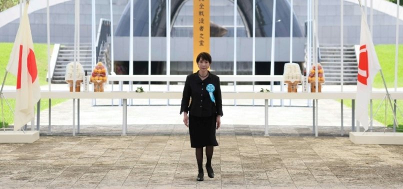 JAPAN PM HECKLED AT WWII MEMORIAL