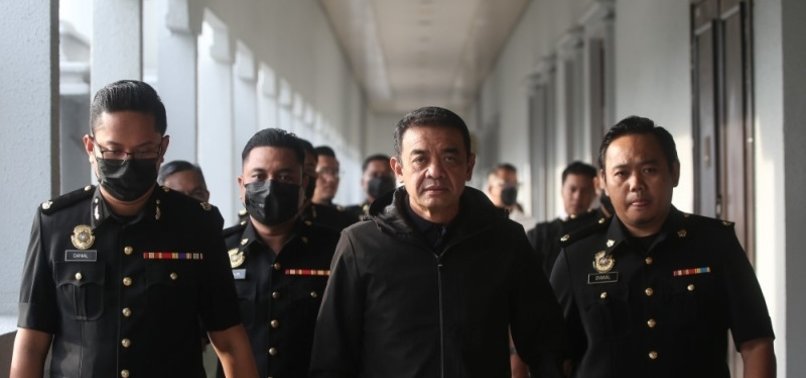 Malaysian ex-army chief, wife charged with corruption