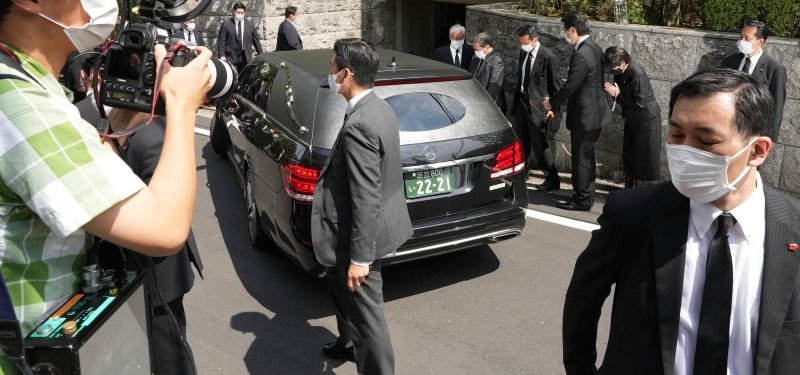 Japan mourns as body of assassinated ex-PM Abe arrives in Tokyo