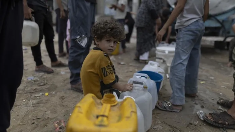 Displaced Gaza families struggle in tents near damaged Islamic University