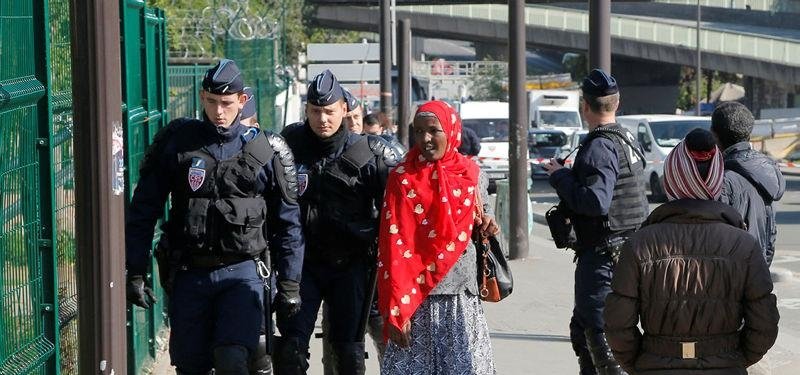 Paris police clear hundreds from makeshift refugee camp