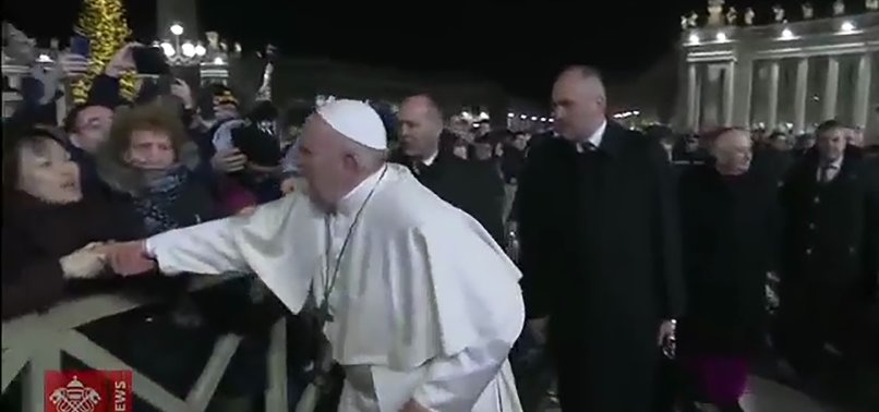 POPE FRANCIS APOLOGIZES FOR SLAPPING ARM OF PILGRIM