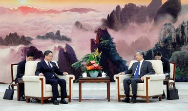 China says will promote development of relations with North Korea