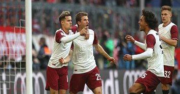 Bayern beats Augsburg 2-0 to go 4 points clear in Bundesliga