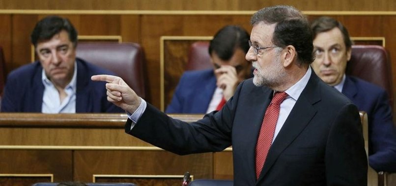 SPANISH PM BLASTS CATALAN PURGE IN REFERENDUM RUNUP