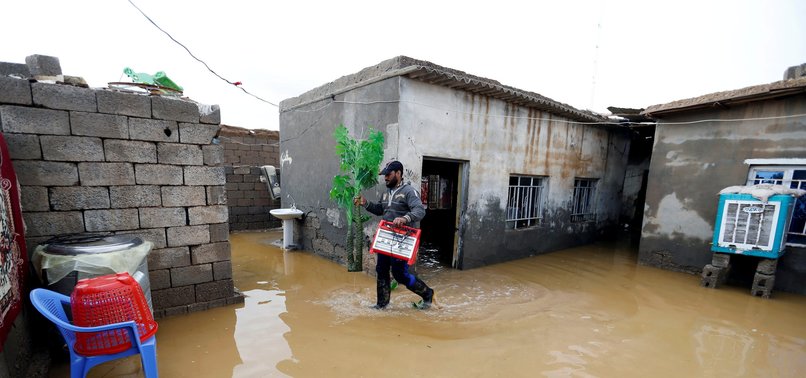 DEATH TOLL FROM NORTHERN IRAQ FLOODS CLIMBS TO 21