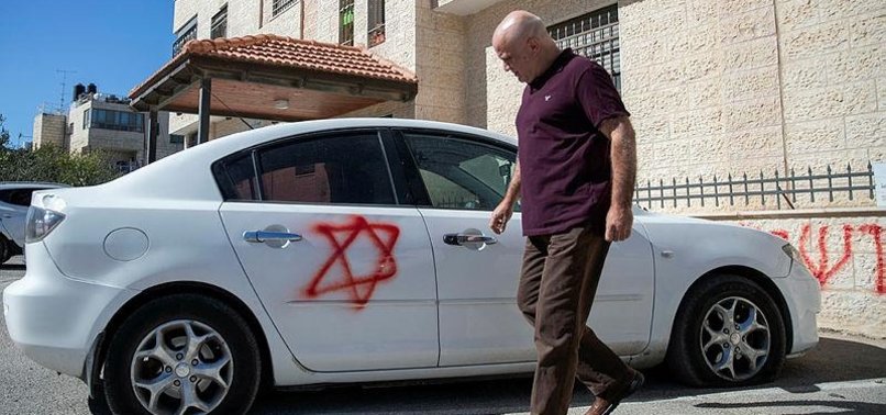 ISRAELI SETTLERS VANDALIZE DOZENS OF CARS BELONGING TO PALESTINIANS IN OCCUPIED WEST BANK