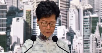 Hong Kong leader delays unpopular bill; activists want more