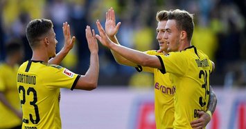 Dazzling Dortmund crush Leverkusen to go back into top spot