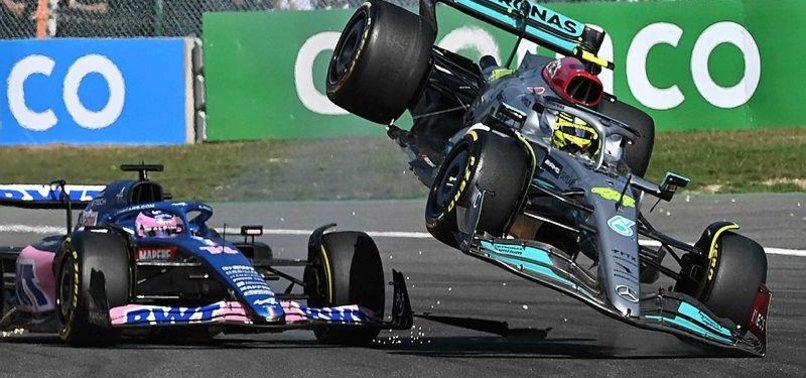 LEWIS HAMILTON TAKES BLAME FOR FIRST-LAP COLLISION WITH ALONSO