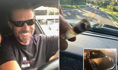 Hunter Biden appears to smoke crack cocaine behind the wheel