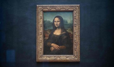 Protesters throw soup at Leonardo da Vinci's masterpiece Mona Lisa painting in Paris museum