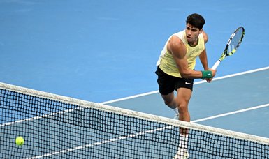 Alcaraz made to work for Australian Open third-round berth