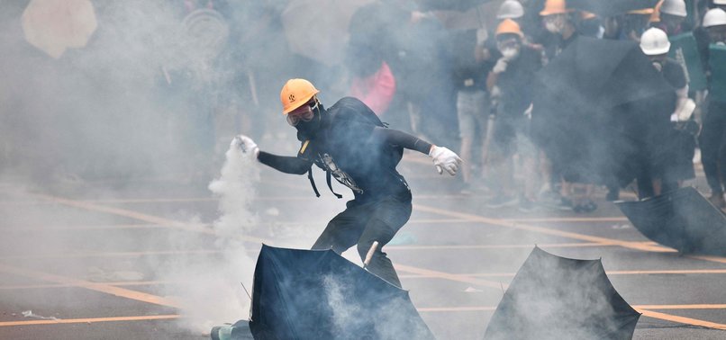 HONG KONG POLICE FIRE TEAR GAS, CLEAR PROTESTERS BY FORCE