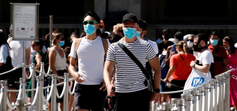 SOME TOURISTS CONFUSED BY NEW COVID-19 MASK RULES IN PARIS