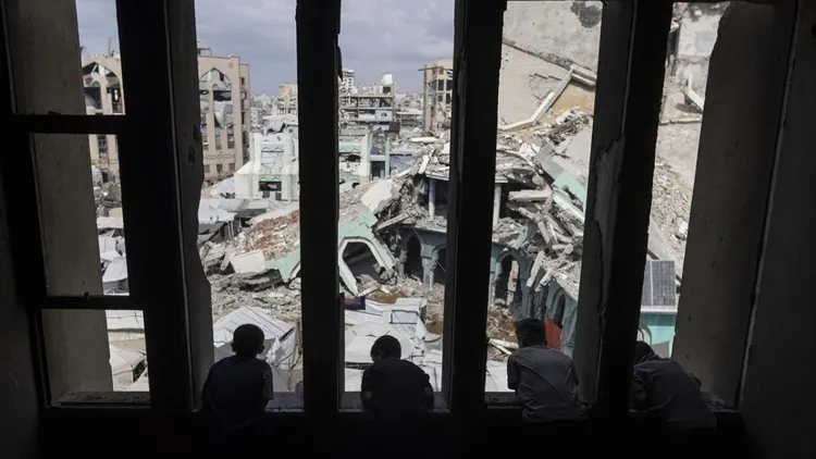 Displaced Gaza families struggle in tents near damaged Islamic University