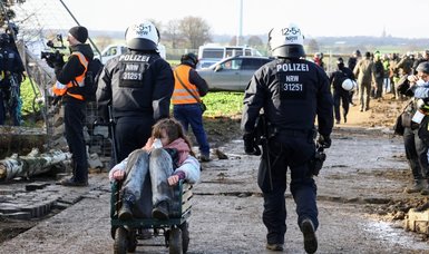 German climate activists clash with police at Lutzerath coal mine site