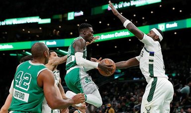 Dennis Schroder drops 38 as Celtics hold off Bucks in OT