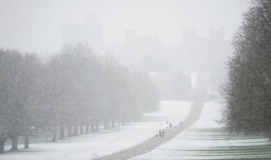 Train, flight cancellations reported as snow blankets Britain