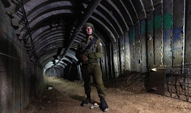 Israel expects long war, sends some reservists home
