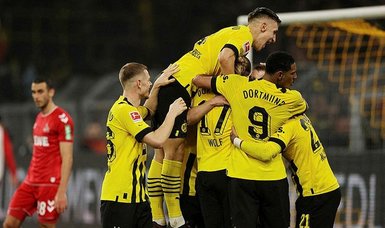 Borussia Dortmund crush Cologne 6-1 to confirm their title ambitions