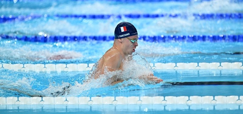 Leon Marchand secures historic double with gold medal in 200m butterfly, breaststroke