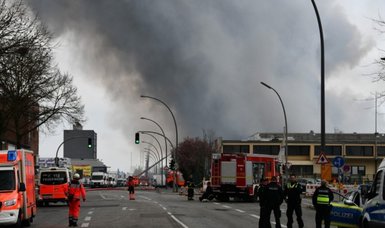 Large fire that blackened Hamburg still burning 27 hours later