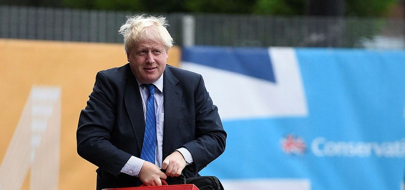 BRITISH PM MAY SIGNALS PLAN TO DEMOTE BORIS JOHNSON, NEWSPAPER SAYS