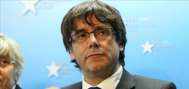 CATALAN LEADER ACCEPTS ELECTIONS BUT STAYS IN BRUSSELS