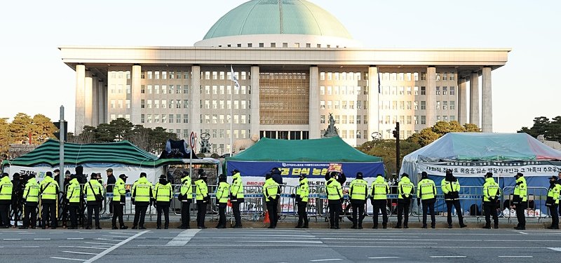 South Korean police raid President Yoon’s office over failed martial law declaration