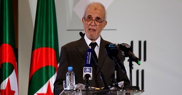 Ex-premier elected Algerian president; thousands prepare to march