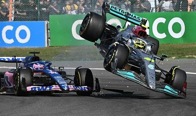 Lewis Hamilton takes blame for first-lap collision with Alonso