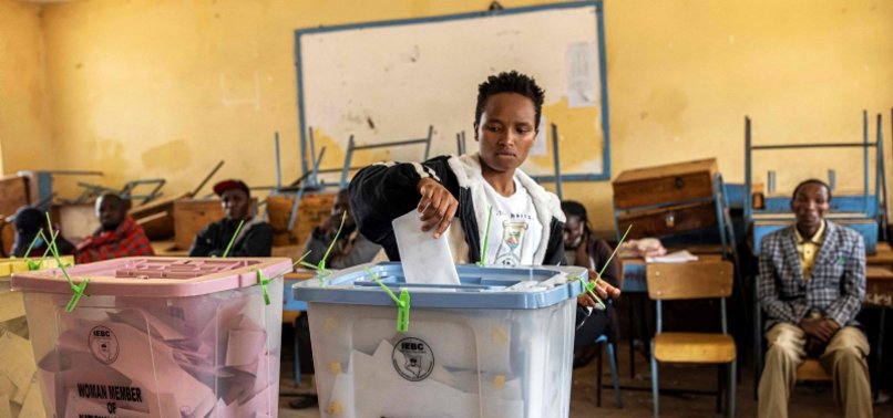 KENYANS VOTING FOR PRESIDENT AND PARLIAMENT IN CLOSE ELECTION