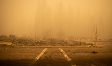Californians flee Dixie Fire that has become second-worst in state history