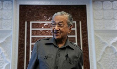 Malaysia former PM Mahathir has improved appetite, but staying in hospital - daughter