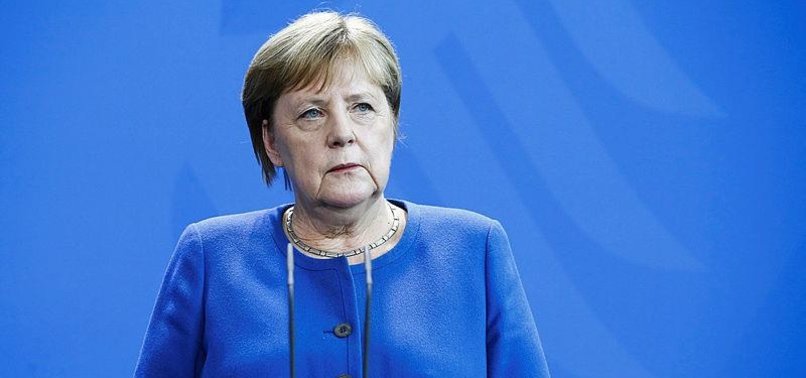 MERKEL URGES EU MEMBERS TO ACT TOGETHER ON CLIMATE