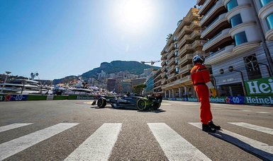 Delighted Hamilton survives crash to take sixth
