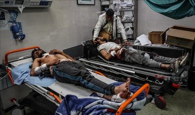 WHO helps evacuate 14 patients from Gaza's besieged Nasser Hospital