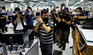 Hong Kong police arrest another Apple Daily editor under security law