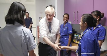 Boris Johnson in ICU with coronavirus, condition improving