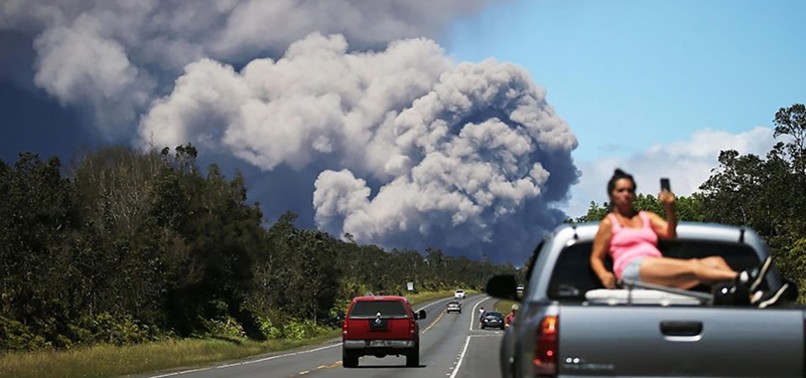 AFTER TWO WEEKS OF LAVA FLOWS, HAWAIIS KILAUEA VOLCANO ERUPTS FROM SUMMIT