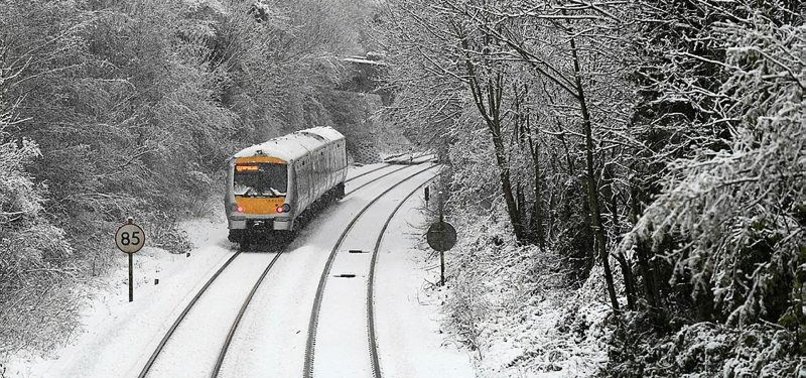 TRAINS CANCELLED, FLIGHTS GROUNDED AFTER SNOW HITS BRITAIN