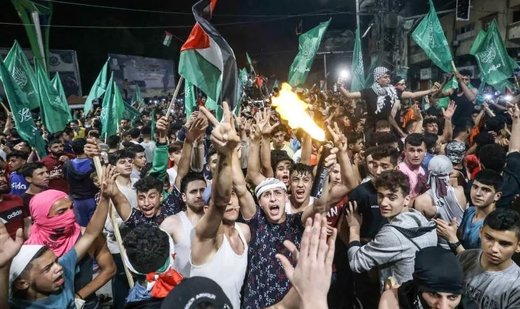 Palestinians celebrate as Hamas accepts proposed cease-fire