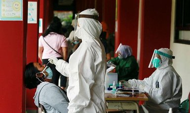 Indonesia caught between surge and slow vaccine rollout