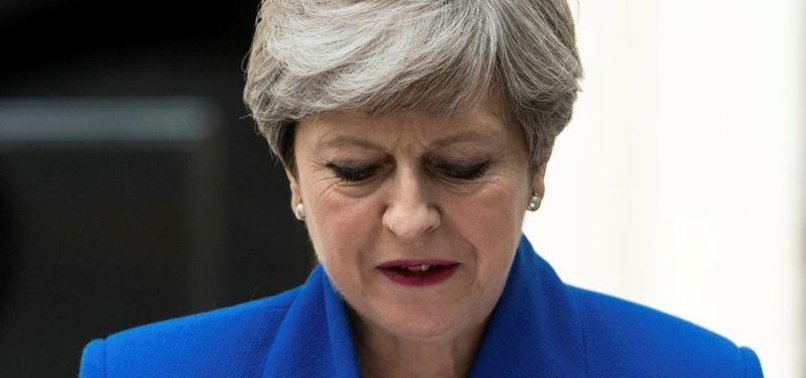 UK PREMIER THERESA MAY UNDER FIRE OVER DUP VOTE DEAL
