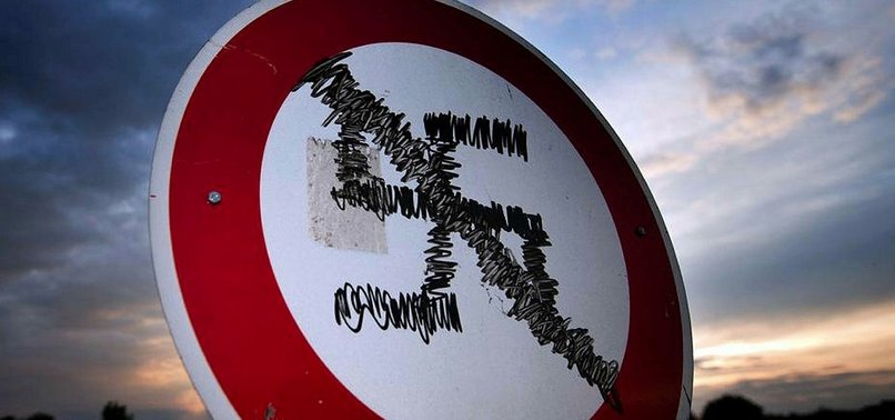 SWISS MOVE TO BAN NAZI SYMBOLS