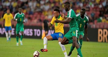 Brazil draws 1-1 with Senegal as Neymar reaches 100 caps