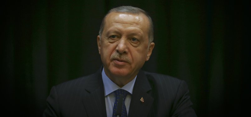 ERDOĞAN SAYS COMMITMENT OF ALL TURKS NEEDED TO COMBAT ATTACKS ON ECONOMY