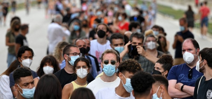 SPAIN MAKES FACE MASKS MANDATORY OUTDOORS AS CASES RISE