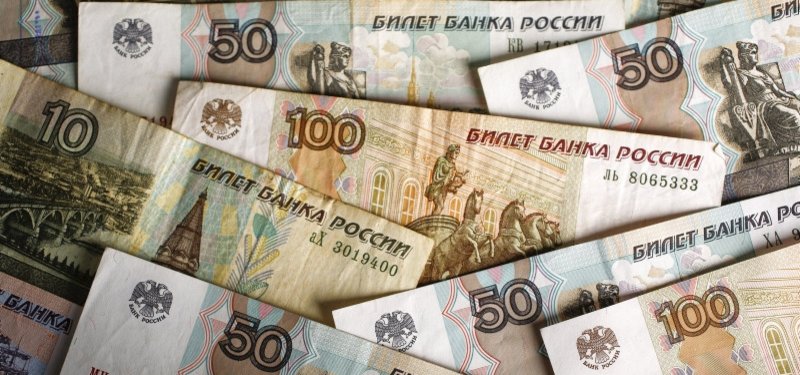 Russian rouble holds firm, boosted by central bank currency interventions
